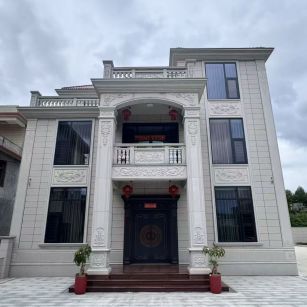 曲靖 芝麻白石材别墅干挂案例展示